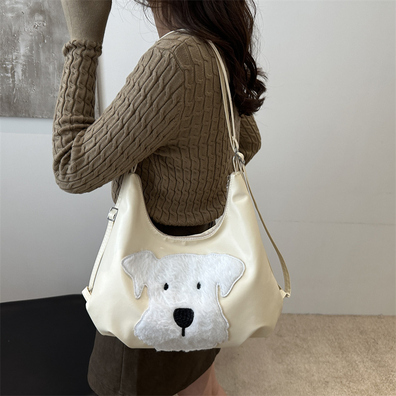 The new autumn and winter 2024 fashion cartoon backpack with simple, individual and niche design, single-shoulder bag and commuter tote bag details Picture