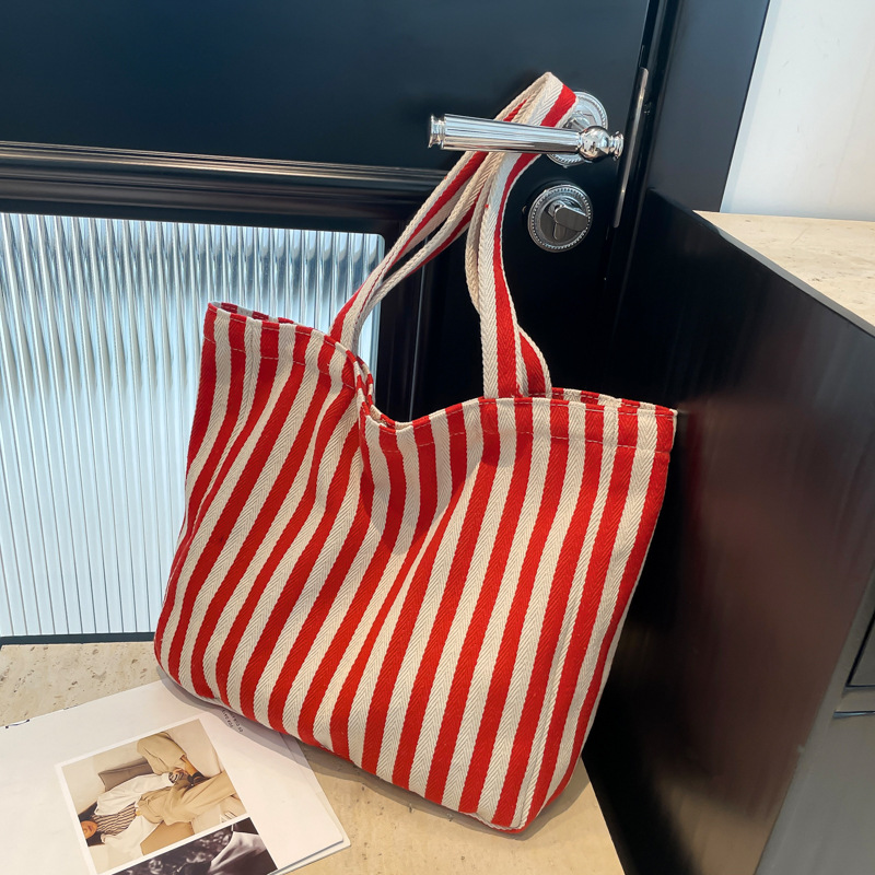 2024 Autumn/Winter new versatile and fashionable striped handbag shopping bag, two-tone large-capacity trendy single-shoulder bag full figure
