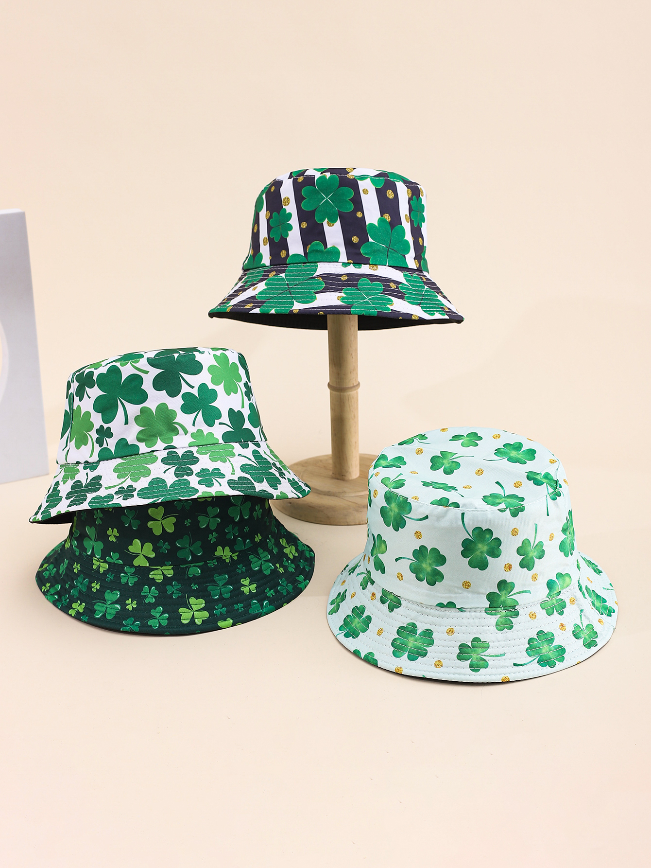 Spring and summer cross-border European and American bestsellers: Lucky four-leaf clover printed double-sided fisherman's hat, outdoor travel, sun protection and shade, adult double-sided fisherman's hat for export full figure