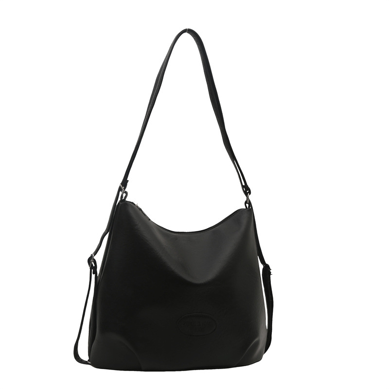 The 2024 new pleated tote bag is a large-capacity casual and fashionable backpack for women, featuring multi-functional texture and a single-shoulder crossbody bag Item Picture
