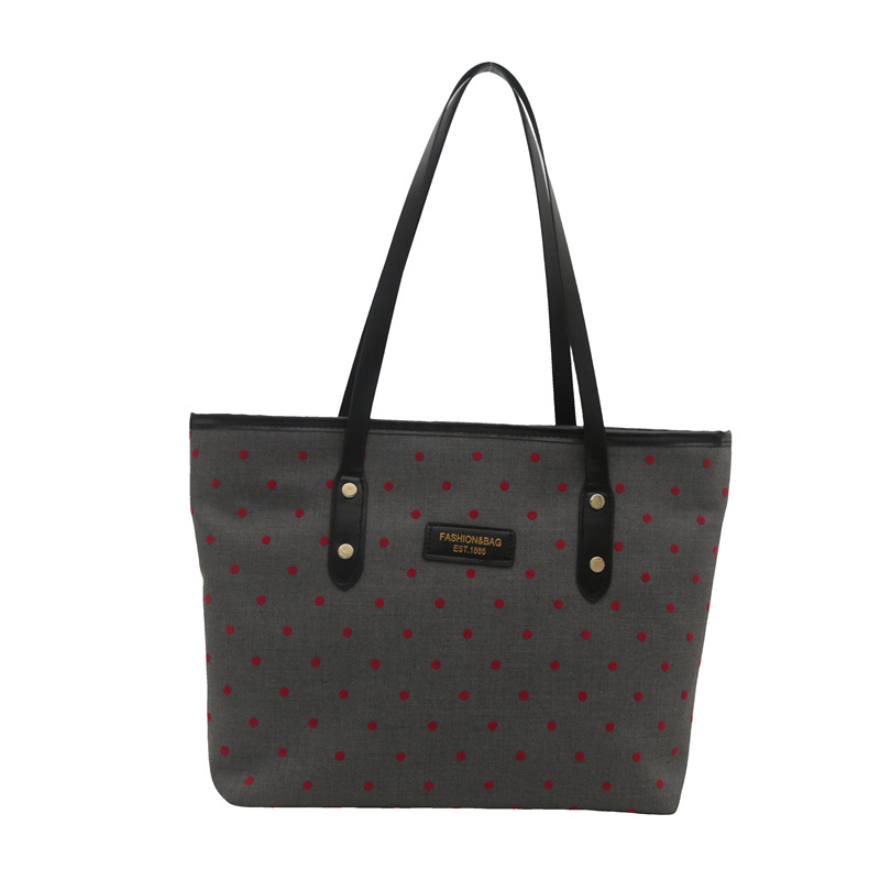 The 2024 new Korean-style tote bag with a college style is stylish, elegant and beautiful. It is a large-capacity single-shoulder and underarm commuter handbag Item Picture