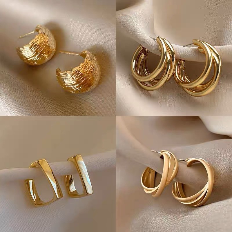 S925 Silver needle European and American exaggerated geometric stud earrings for women, light luxury, fashionable and high-end style, metal earrings wholesale full figure
