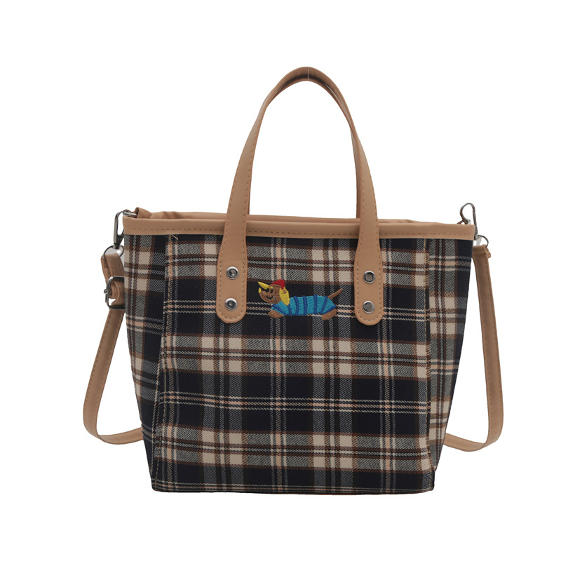 Cross-border personalized hand-carried fashionable and casual bucket bag for women, new autumn 2024 collection, contrasting color striped single-shoulder quality crossbody bag Item Picture