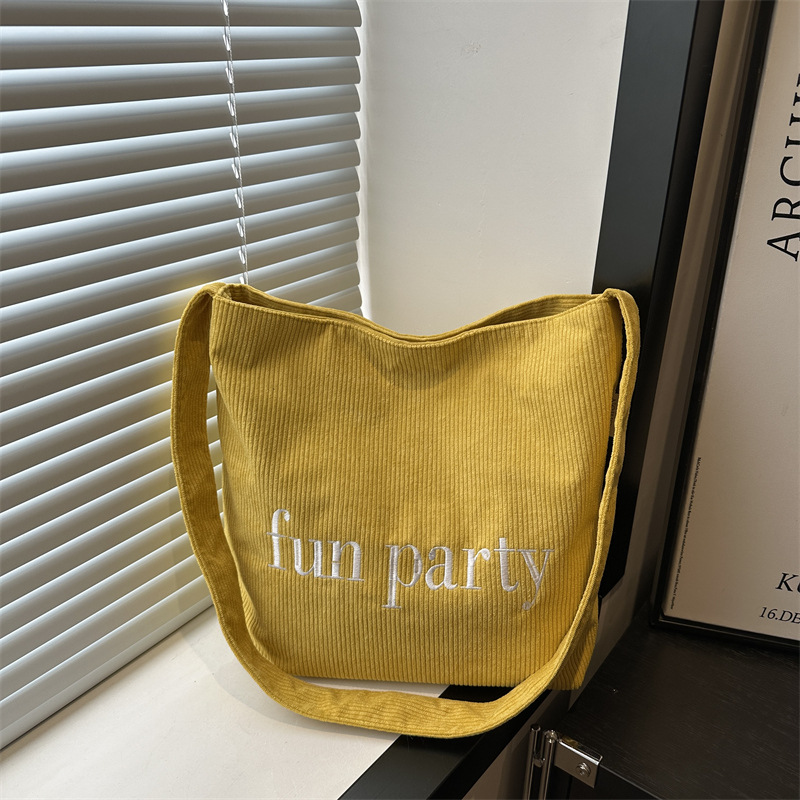 Simple hand-held corduroy large-capacity daily casual work single-shoulder bag, niche tote bag, fashionable canvas bag full figure