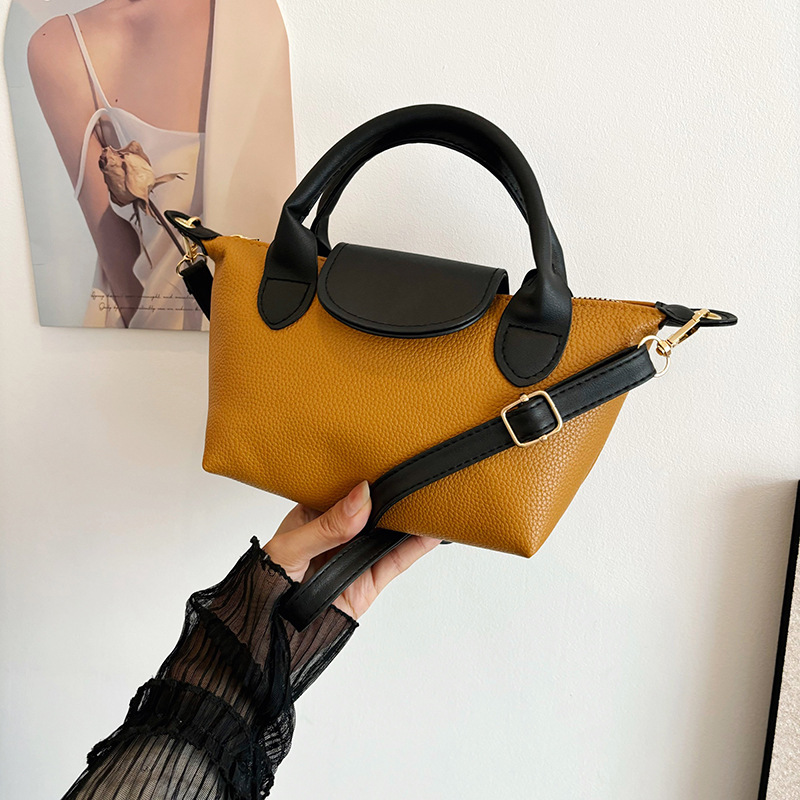 The new 2024 autumn/winter collection of handbags featuring a niche soft skin dumpling bag, color-blocking and patchwork single-shoulder bag, crossbody bag and commuter women's bag full figure