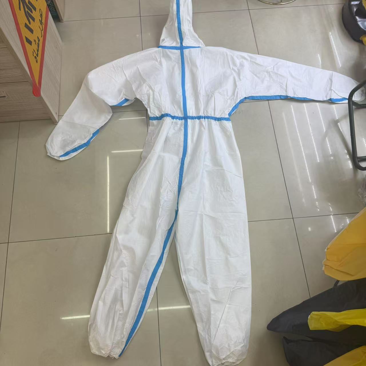 Blue stripe protective suit, one-piece cap, non-woven fabric work clothes, waterproof disposable isolation clothing for livestock farms Item Picture