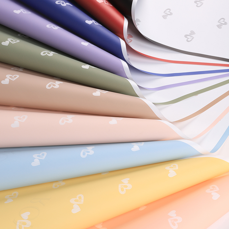 Heartfelt English flower wrapping paper, waterproof heart-shaped pearlescent film wrapping paper, flower bouquets, flower shop materials