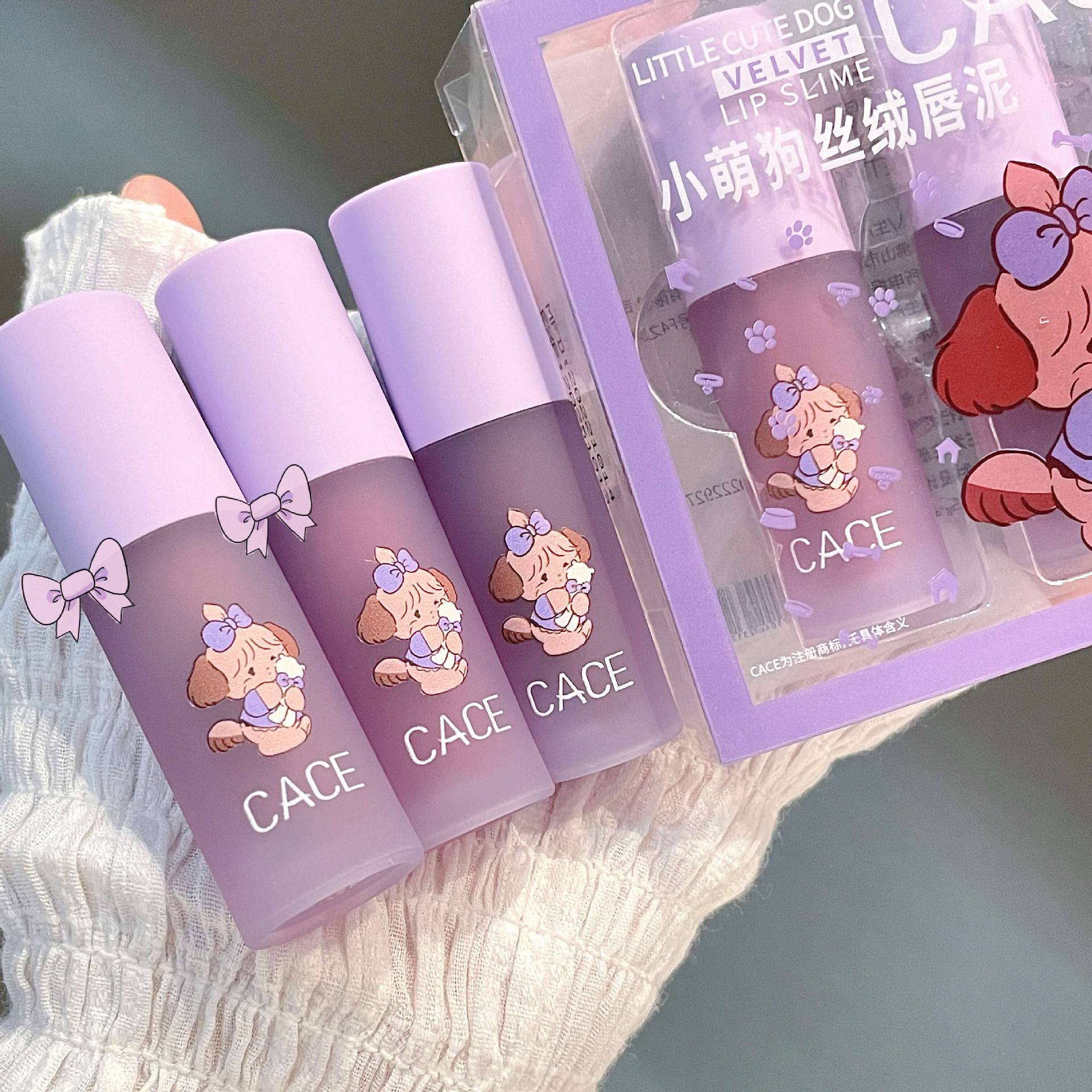 CACE Little Cute Dog Velvet Lip Gloss is available in six colors for long-lasting makeup. It is a versatile new product with a matte lip gloss that can be used for color and whitening. Wholesale full figure
