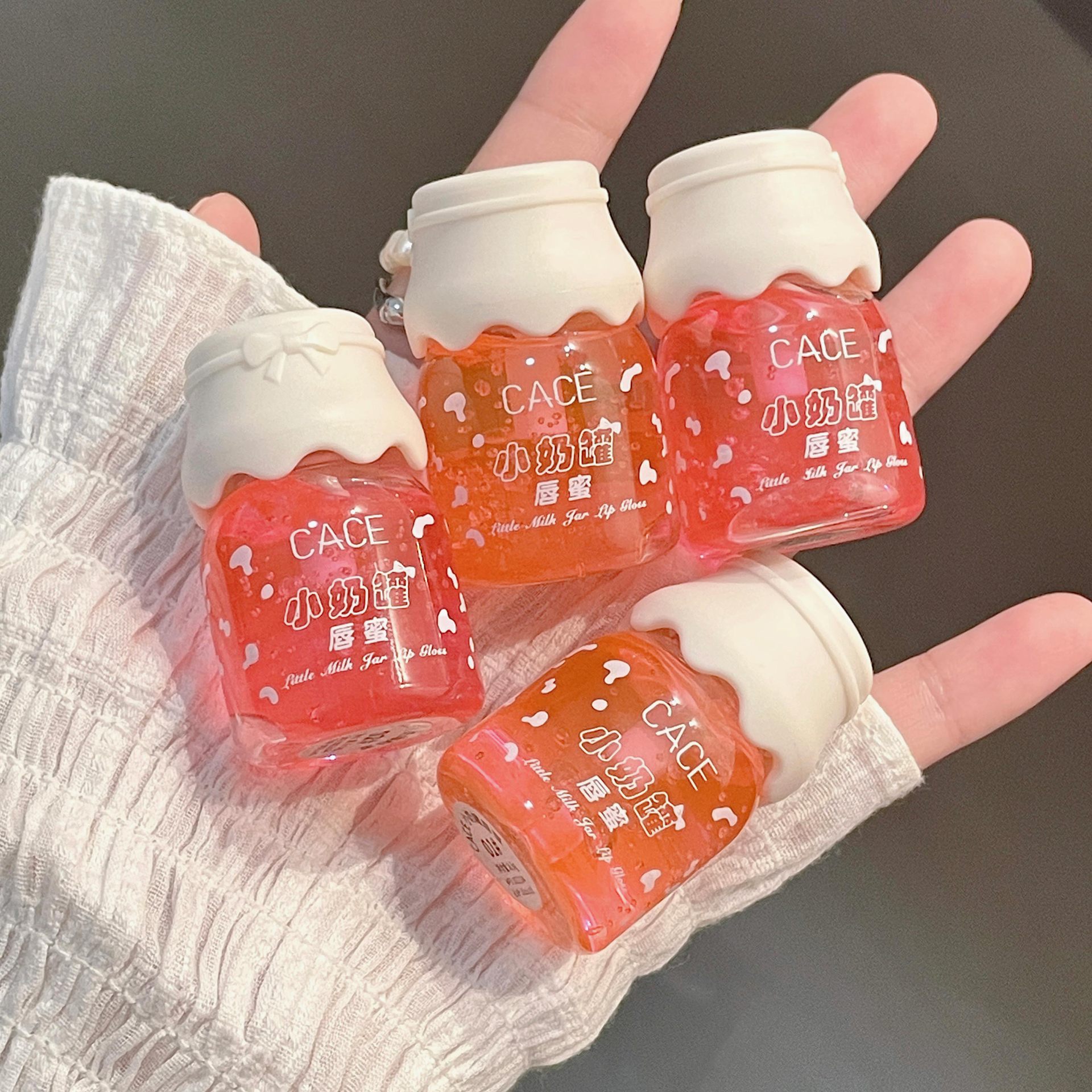 CACE Small Milk Can Fruit-flavored Lip Gloss moisturizes and hydrates, reduces lip lines, and is a versatile lipstick for lip care. Wholesale at affordable prices full figure