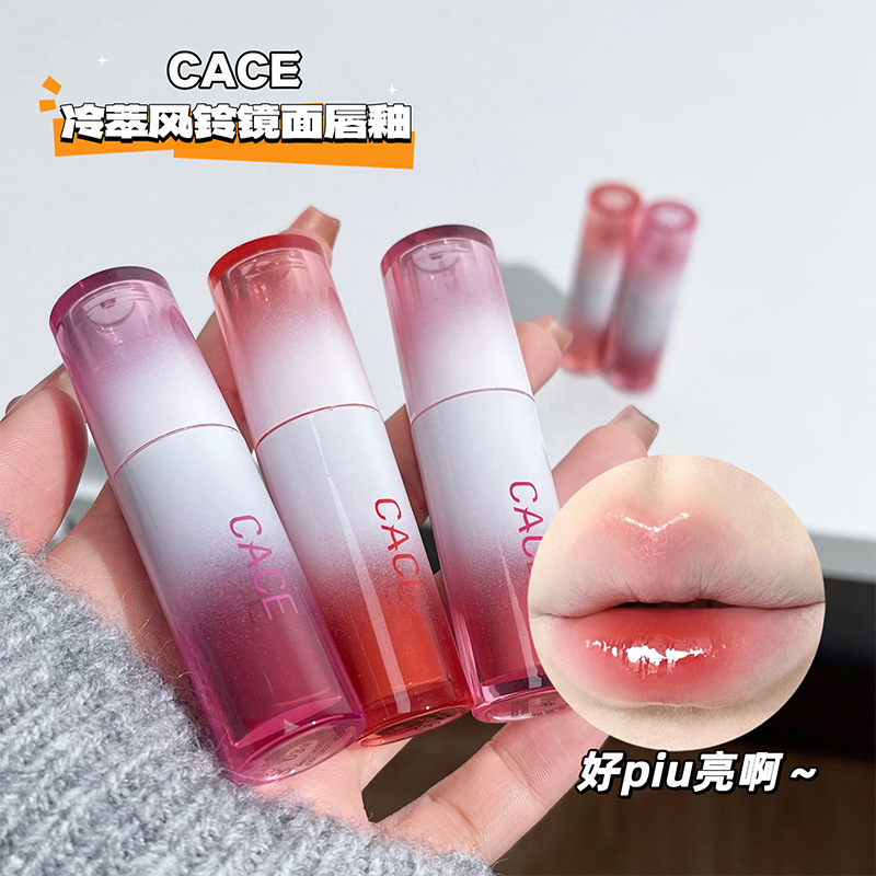CACE Cold Extract Wind chime Mirror Lip Gloss moisturizes the chubby lips with a water-like luster that doesn't stick to the cup. Pink lip gloss for cross-border use full figure