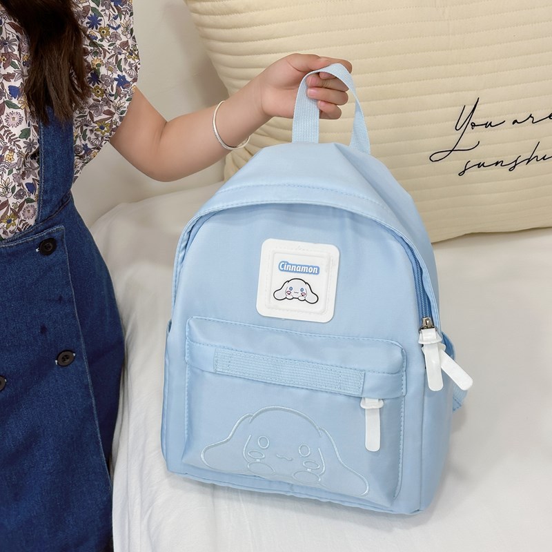 Simple and elegant Harajuku style pudding dog backpack, trendy boy's cool wide shoulder strap backpack with reduced load, kindergarten children's bag Application Scenario