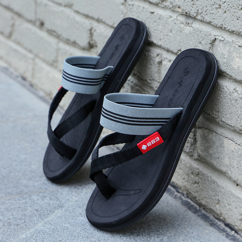 Wholesale of Lu 'an's new summer men's beach shoes, outdoor casual sandals, thick-soled couple's board slippers and flip-flops full figure