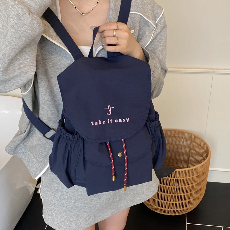 A new 2025 lightweight and versatile women's backpack made of nylon fabric for casual travel Application Scenario