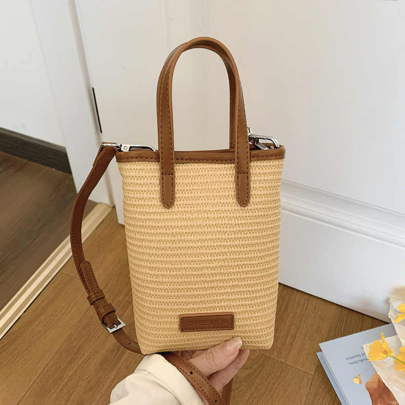 Summer straw woven beach bag 2025 New style seaside vacation handbag, simple and versatile bucket bag, woven crossbody bag full figure