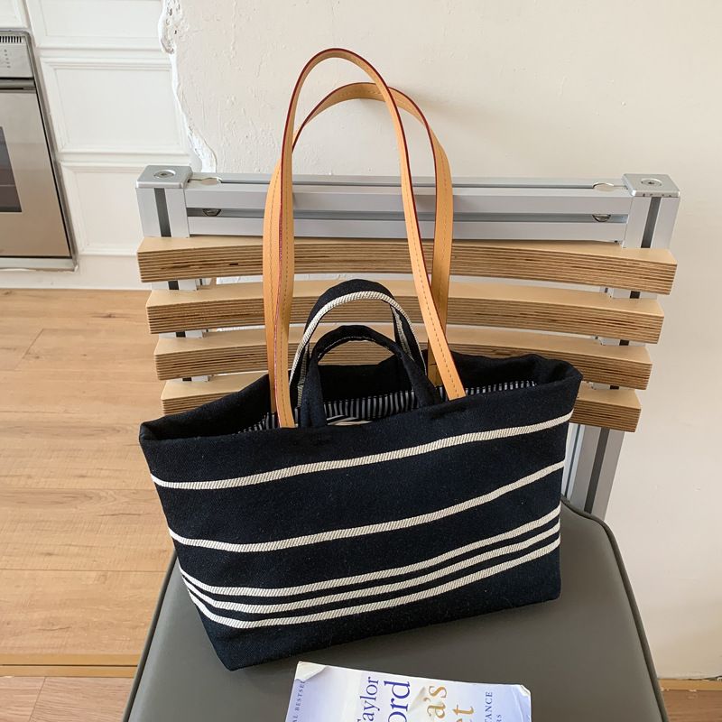 2025 New Korean version large-capacity tote bag, canvas bag, striped single-shoulder beach travel bag, simple crossbody bag for women full figure