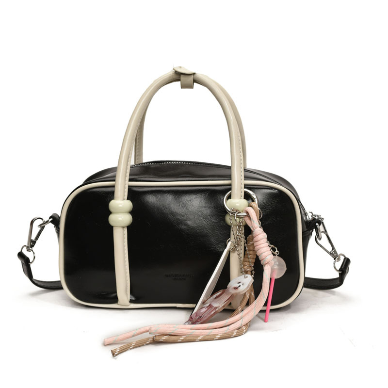 Korean retro niche hand-held bowling bag, Spring 2025 new solid color single-shoulder crossbody bag, elegant handbag Item Picture