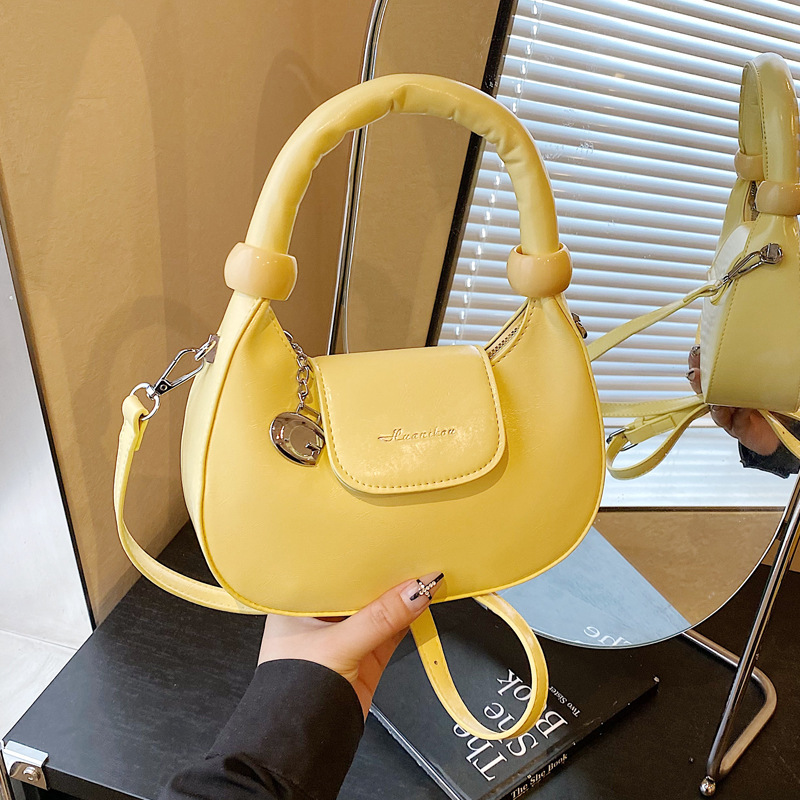 Ladies' niche crescent-shaped bag 2025 Summer new single-shoulder bag, fashionable, casual and simple niche hand-held crossbody bag full figure