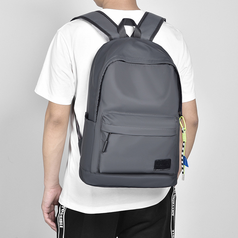 2023 New Korean-style personalized solid color backpack, large-capacity versatile casual schoolbag, fashionable and simple student backpack Specification drawing