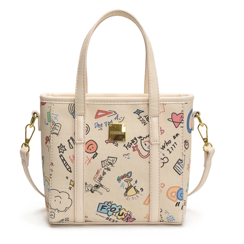 Fashionable and niche design single-shoulder crossbody bag for women 2025 new cartoon printed hand-held bucket bag with pendant Item Picture