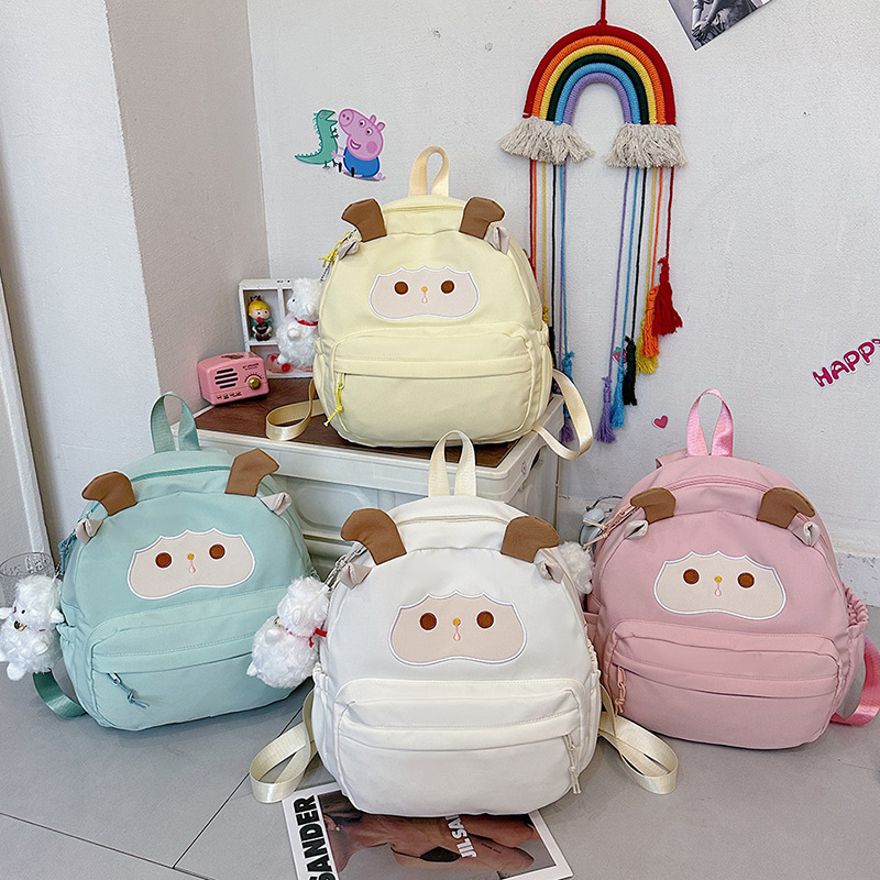 This cartoon little lamb children's backpack is a refreshing and cute summer bag with a girlish heart. It's a versatile student bag with a large storage capacity and is adorable full figure