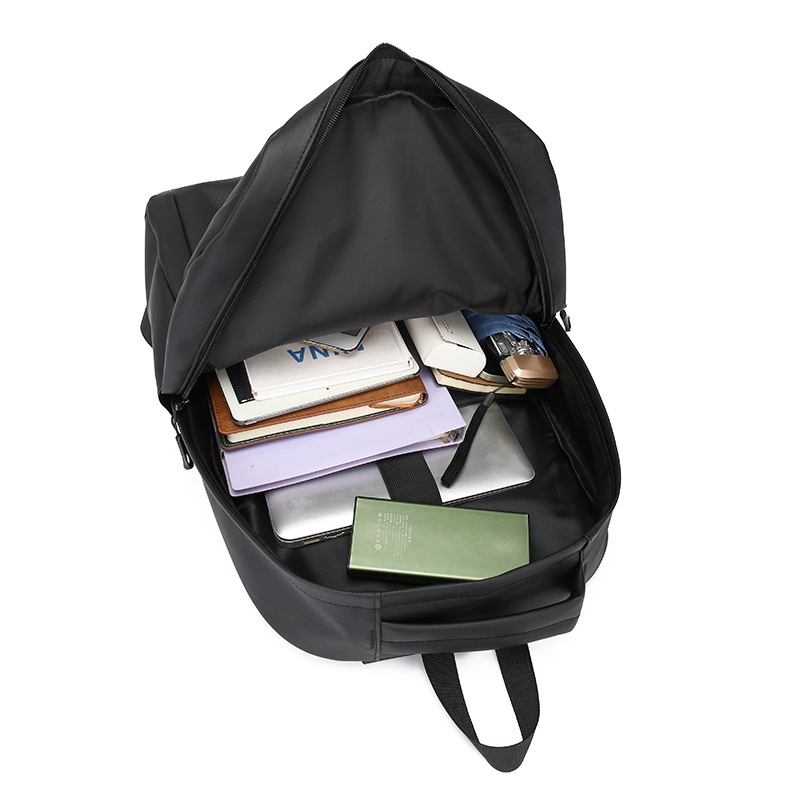 Cross-border wholesale of new large-capacity school bags for junior and senior high school students, foreign trade backpacks, men's Korean version simple commuting computer bags Item Picture