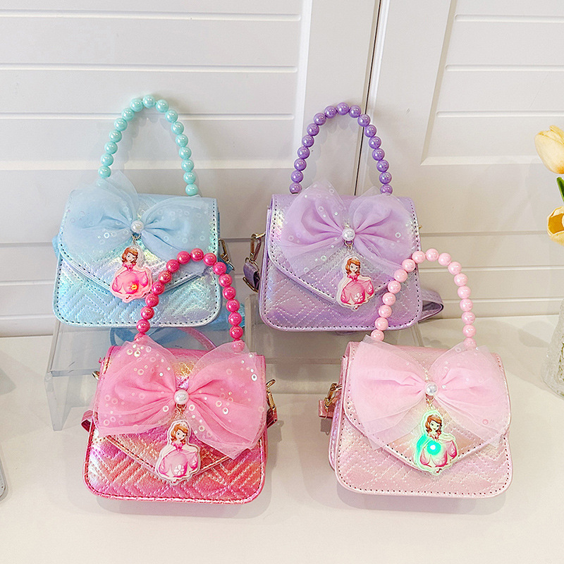 2024 New Little girl children's single-shoulder bag with cartoon Elsa lighting up, bow, hand-held ice and snow, and crossbody bag details Picture