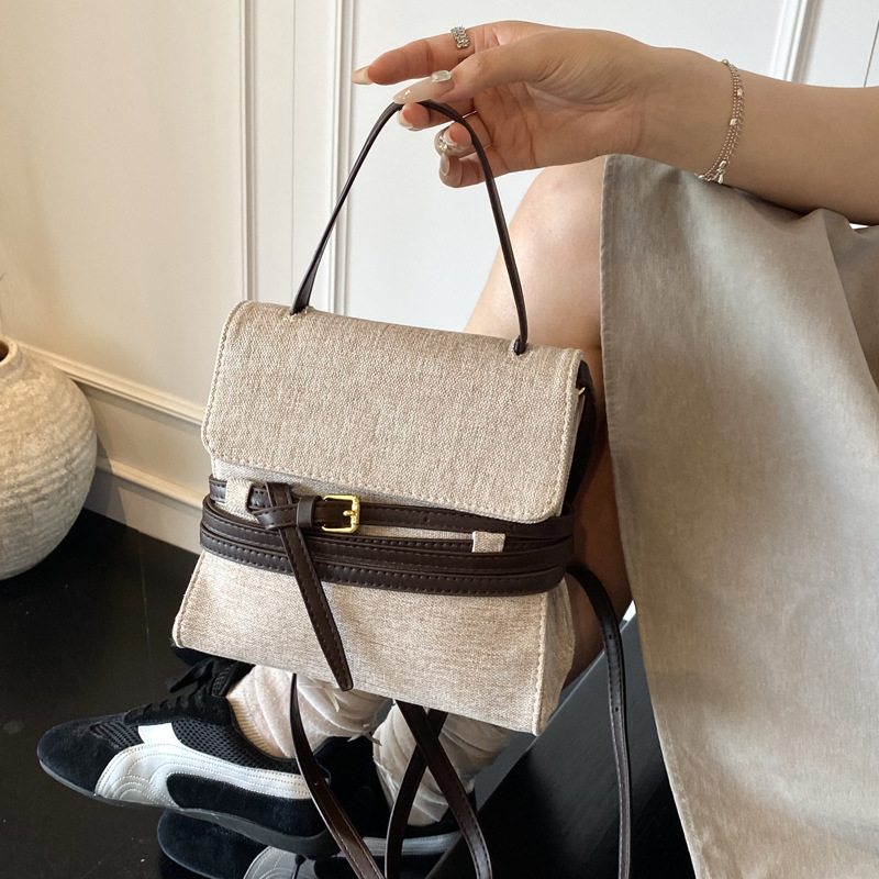 This year, the versatile commuter backpack is in fashion. For the summer of 2025, it's a stylish and casual Korean version of a hand-held crossbody bag full figure