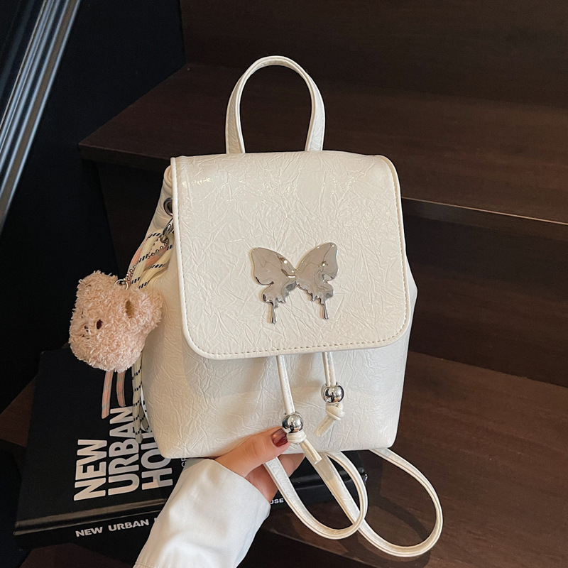A new summer 2025 casual and simple backpack for women, a large-capacity single-shoulder bag for commuting to work, and a solid color bucket bag full figure