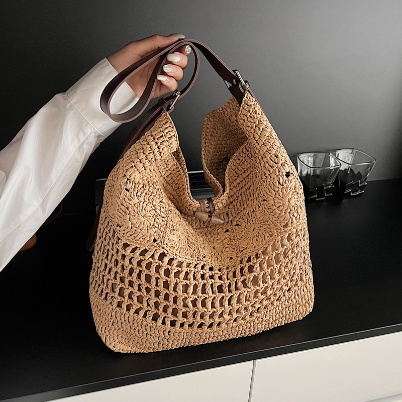 2025 New summer French laid-back seaside vacation bag, niche straw woven bag, hand-woven women's bag, large capacity full figure