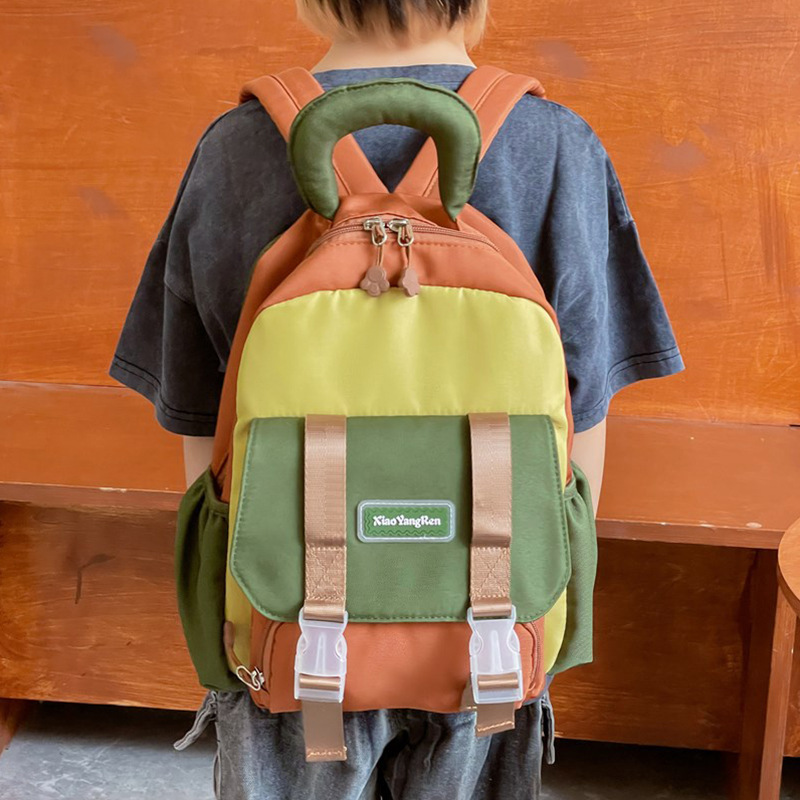 The 2024 new Korean color-blocking and fresh backpack for children is cute and stylish. It's a kindergarten schoolbag and a backpack for outings Application Scenario