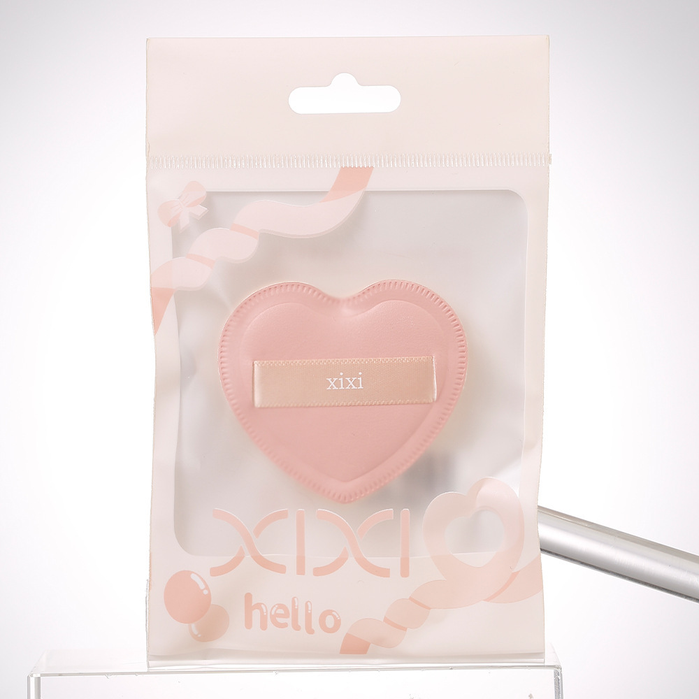 xixi Sweetheart Cotton Candy Powder Puff, compact, portable, super soft, dry and wet dual-purpose, affordable student powder puff Application Scenario