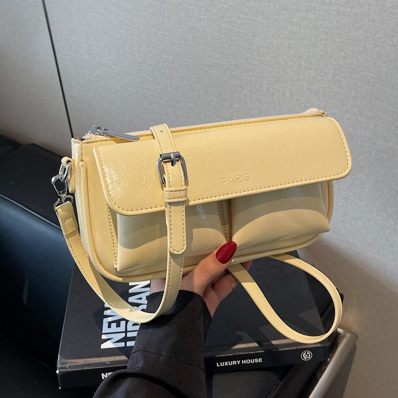 A solid color design bag for women in 2025, a trendy and fashionable single-shoulder underarm bag, and a retro commuter crossbody bag full figure