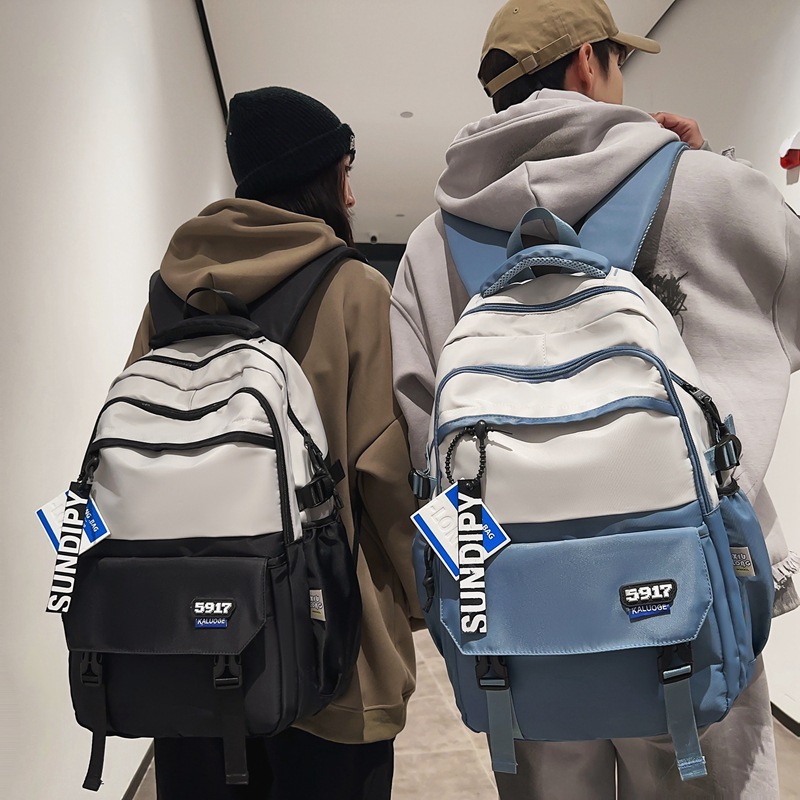 A new color-blocking computer backpack for girls in the college style, a large-capacity backpack for boys in street fashion full figure