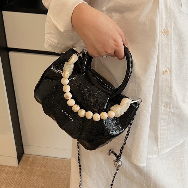 A stylish and trendy beaded bag for women, a new summer chain crossbody cloud bag for women in 2025 details Picture