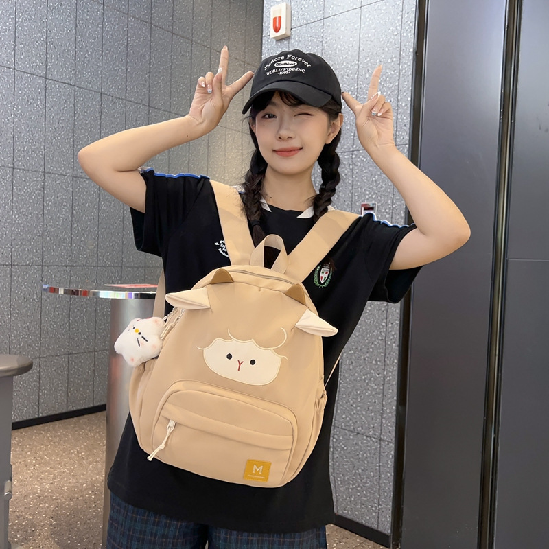 Cute little lamb schoolbag, fashionable backpack for female college students, high school girls' appearance level, large-capacity backpack for junior high school students' travel, a trend Specification drawing