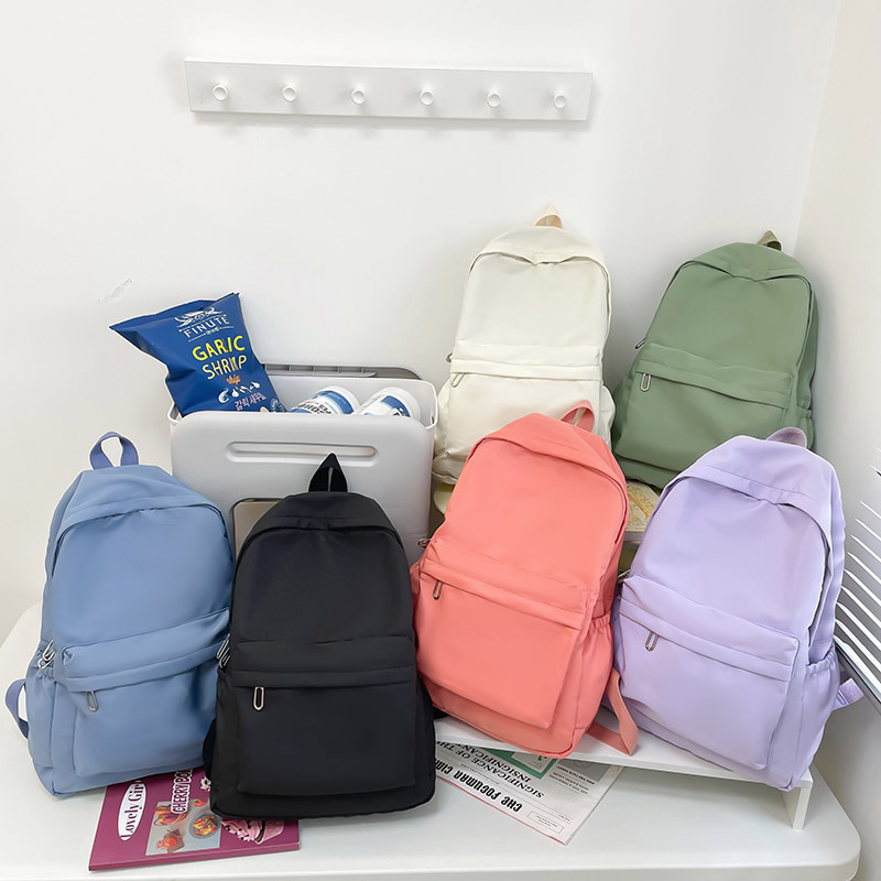 New solid-color backpacks for winter 2024, casual backpacks for women, cross-border schoolbags, simple ins large-capacity travel bags details Picture