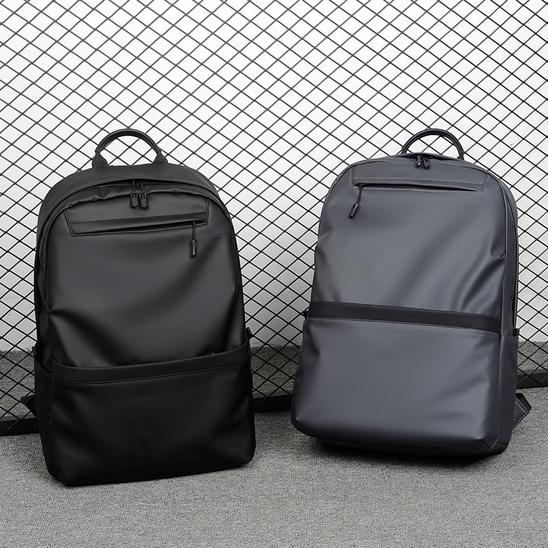 A new minimalist backpack for men, a Korean-style casual and fashionable backpack for laptops, with a logo printed on it full figure