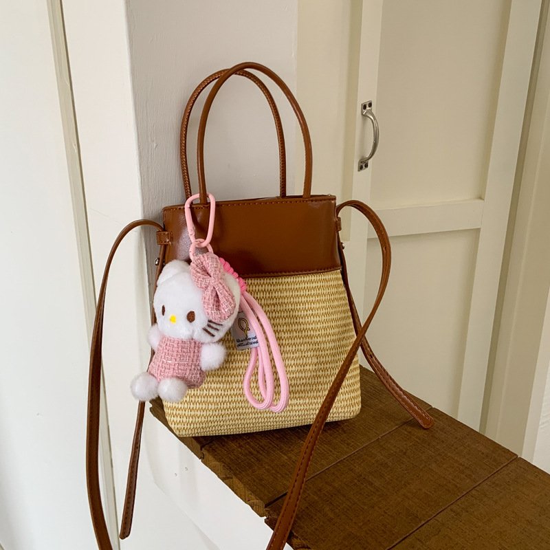 Korean style simple and fashionable woven mobile phone bag for women 2025 summer new seaside vacation crossbody straw woven bucket bag full figure