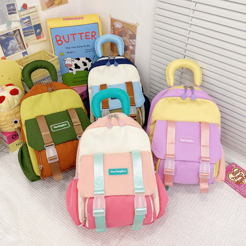 The 2024 new Korean color-blocking and fresh backpack for children is cute and stylish. It's a kindergarten schoolbag and a backpack for outings details Picture