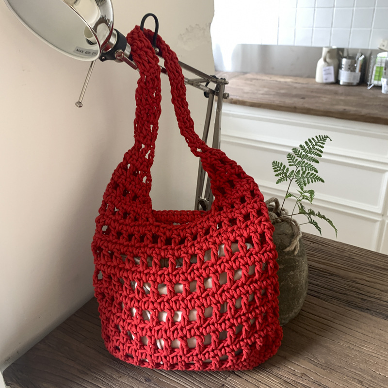 Large-capacity commuting woven bag for women, 2025 new style retro hollowed-out knitted bag, relaxed grid beach bag full figure