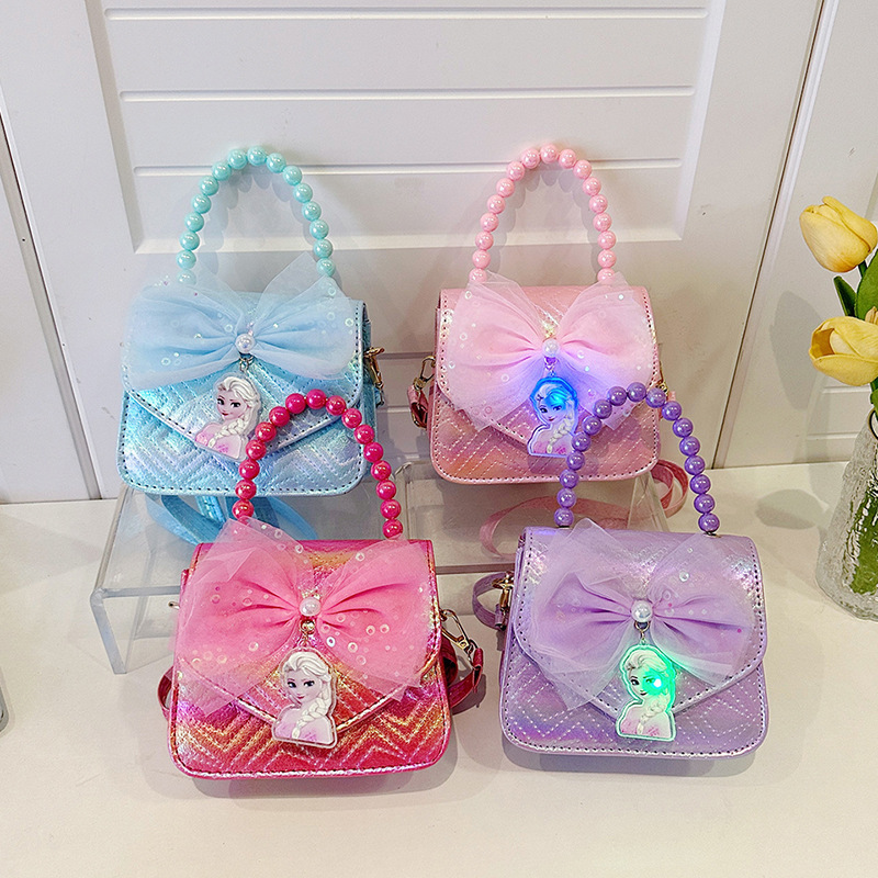 2024 New Little girl children's single-shoulder bag with cartoon Elsa lighting up, bow, hand-held ice and snow, and crossbody bag full figure
