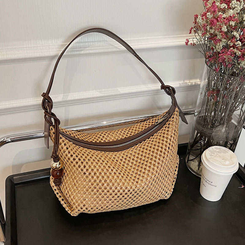 Summer niche vacation-style woven underarm bag for women 2025 new casual seaside and beach single-shoulder handbag trend full figure
