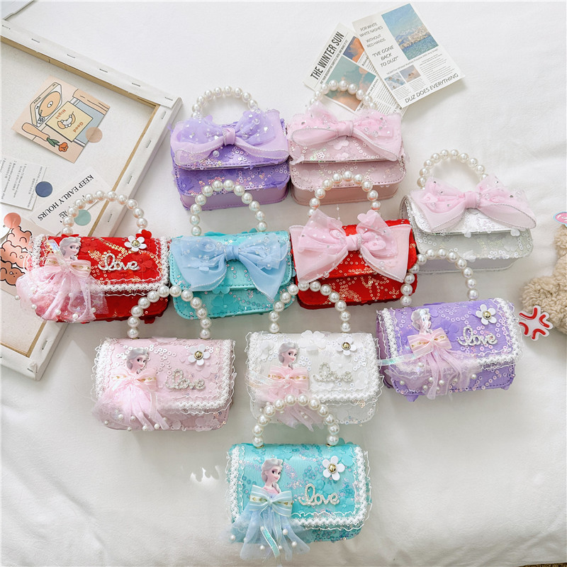 Korean-style fashionable pearl children's bag, little Chanel-style hand-held bag, pearl handbag, cute girl single-shoulder crossbody bag full figure