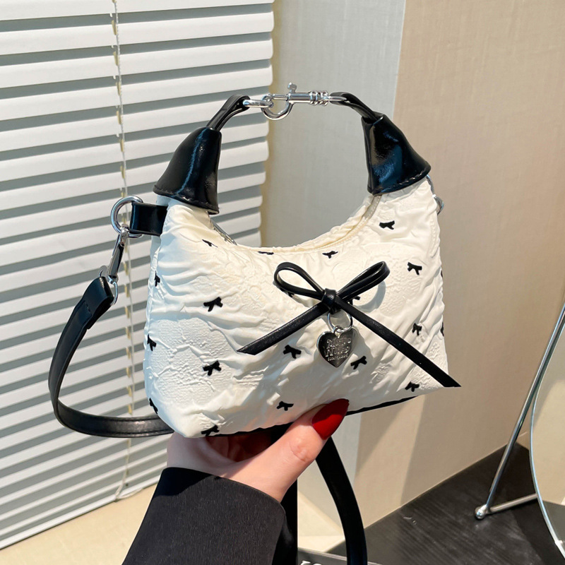 A versatile bow-shaped crossbody bag for women, a simple Korean-style handbag, a new summer 2025 fashionable dumpling bag full figure