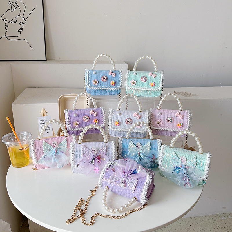 This year, small bags, girls' accessory bags, fashionable pearl handbags, and Korean-style children's single-shoulder crossbody bags are in fashion full figure
