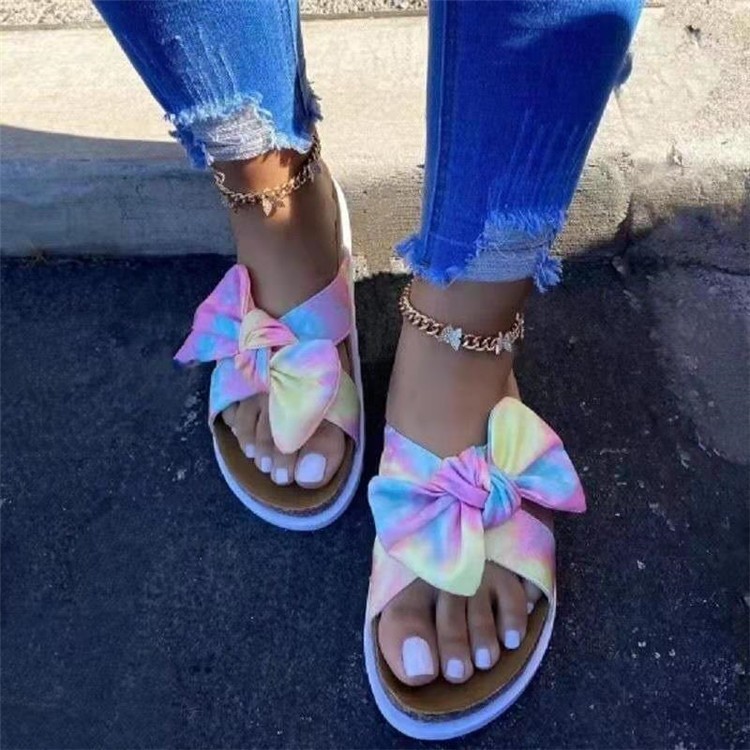 The 2021 summer new style of large-sized cool slippers for women in foreign trade, featuring leopard print and colorful women's shoes with bow thick-soled outerwear details Picture