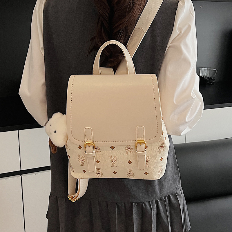 This is a niche design for women, featuring cartoon animal prints. It is a pink backpack with a high level of appearance and large capacity for travel Specification drawing