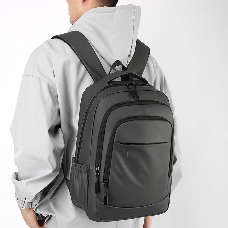 2024 New Korean version men's backpack, large capacity, simple commuting computer bag, junior high school and senior high school schoolbag, cross-border details Picture