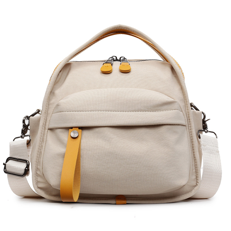 A simple and casual single-shoulder canvas bag for women in the summer of 2025, a high-end crossbody bucket bag Item Picture