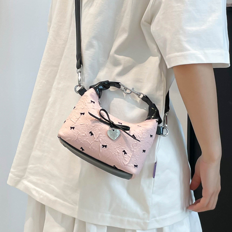 A versatile bow-shaped crossbody bag for women, a simple Korean-style handbag, a new summer 2025 fashionable dumpling bag details Picture